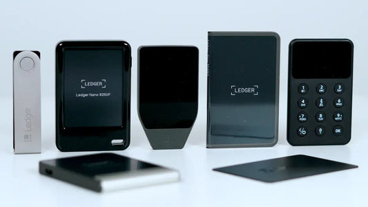Tangem, Trezor, and Ledger hardware wallets arranged for comparison